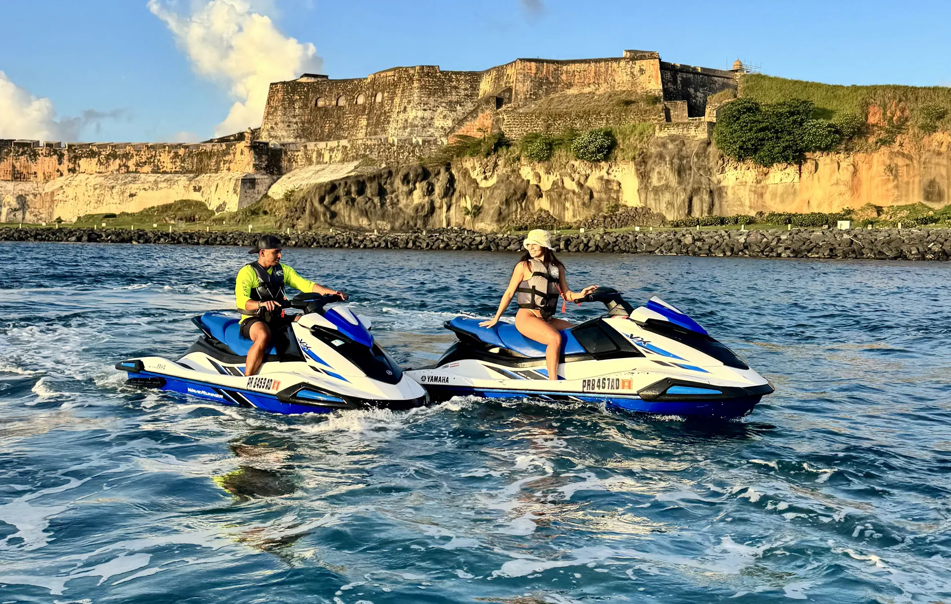 Technicians installing an outdoor AC condenser