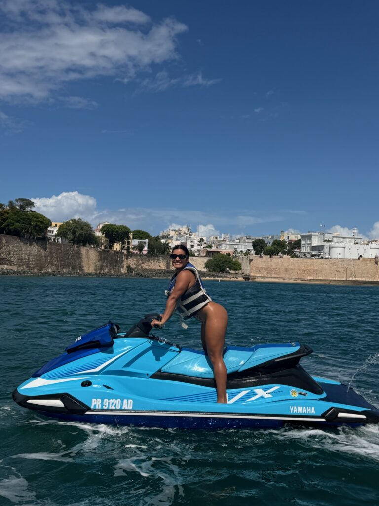 Jet ski in San Juan Bay with Old San Juan historic Spanish fortress behind